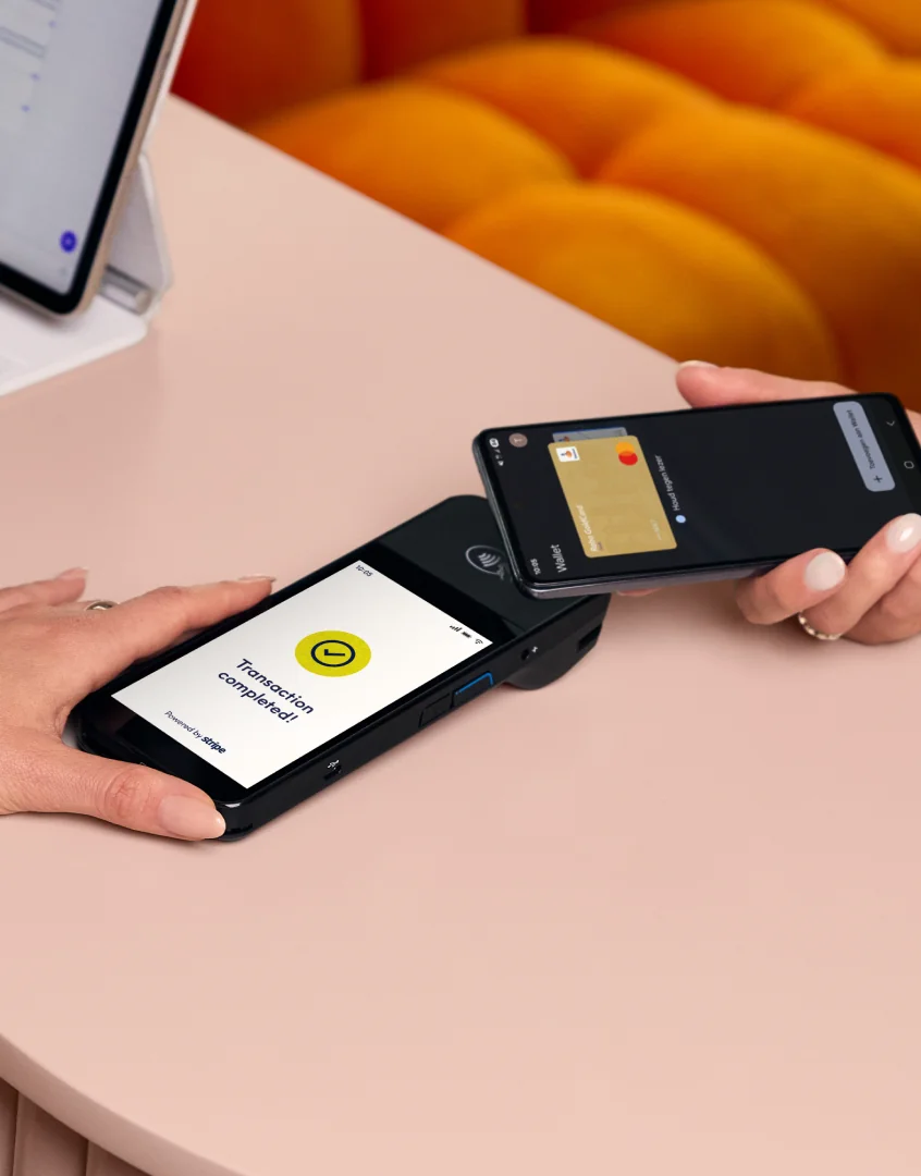 Contactless payment on a Treatwell Pay card machine showing transaction completed